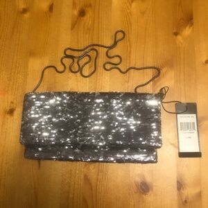 BCBG charcoal sequin clutch